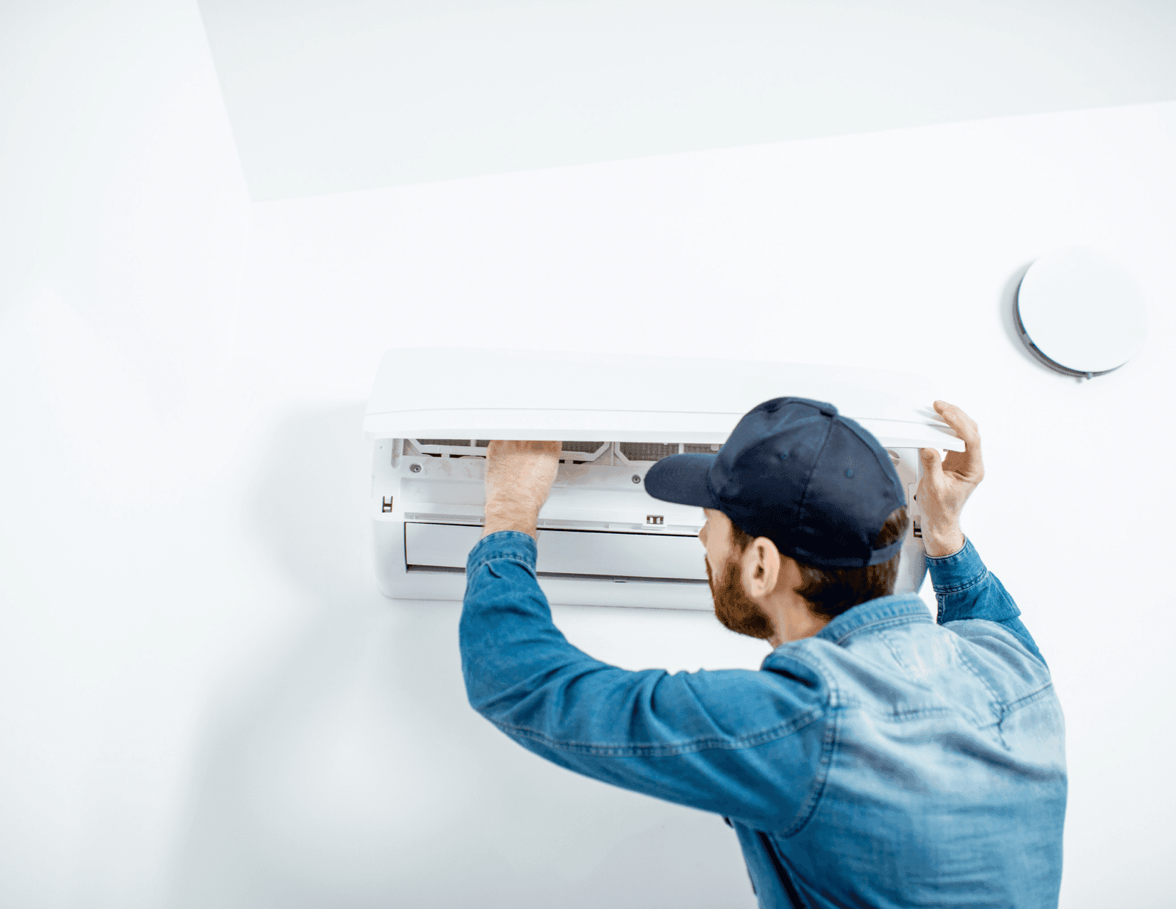 technician working on ductless unit